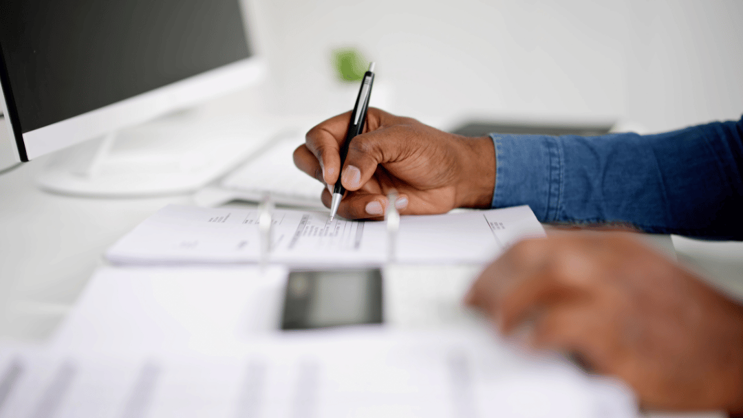 person organizing reciepts